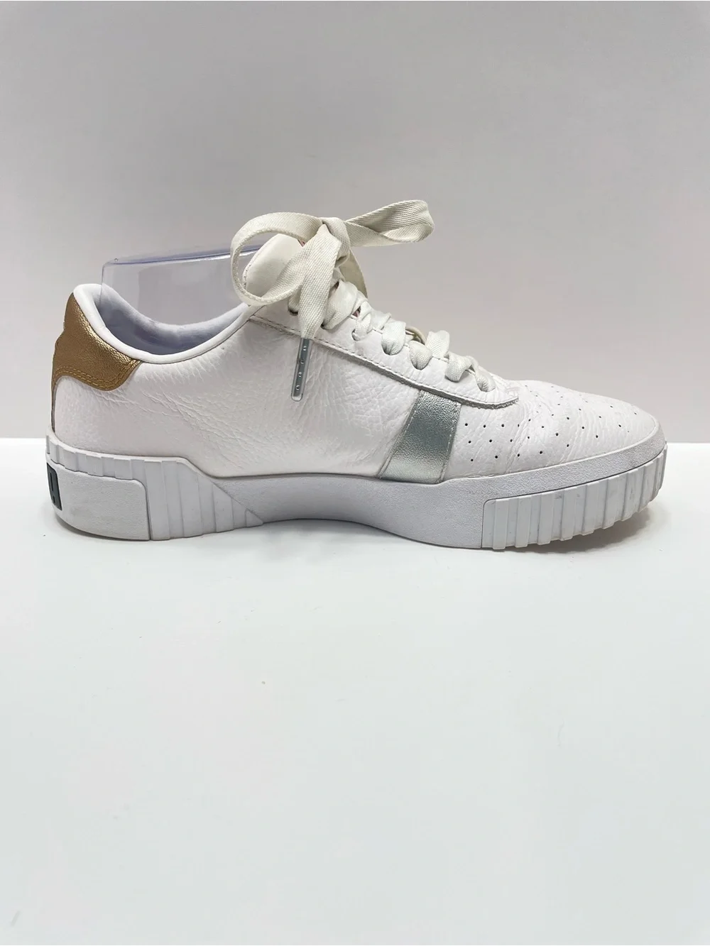 Women’s 7.5 Puma Cali Hacked White with gold and silver accents